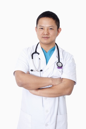 Portrait of veterinarian, arms crossed, studio shotの写真素材