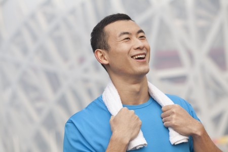 Portrait of young athletic man in Beijingの写真素材