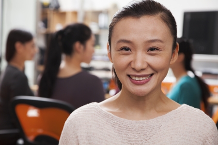 Portrait of mid adult businesswoman in the officeの写真素材