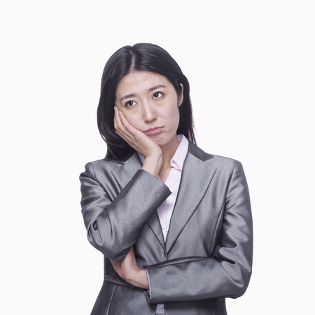 Businesswoman with sad expressionの写真素材