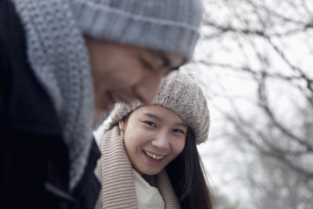 Couple Playing in the Snowの写真素材