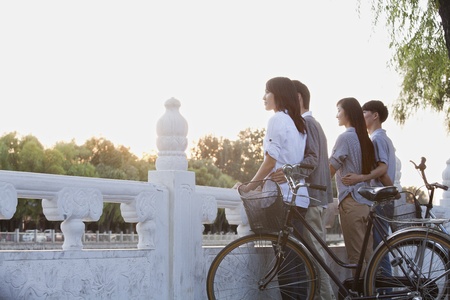 Two couples by HouHai Lake with Bicycles in Beijingの写真素材