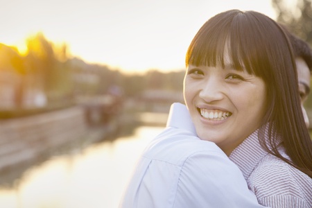 Happy Young Couple Huggingの写真素材