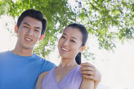 A Young Couple in Parkの写真素材