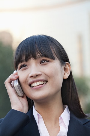 Young Businesswoman Talking on Cell phoneの写真素材