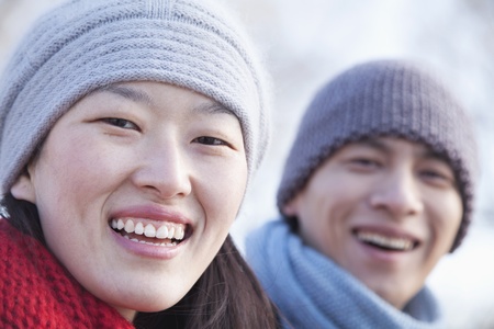 Young Couple In Beijing in the Winter, Close Up on Faceの写真素材