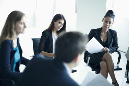 Business people sitting in a business meetingの写真素材