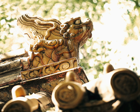 Close-up of carvings on the roof of the pagoda, daytimeの写真素材