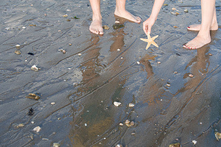 Two people on the beachの写真素材