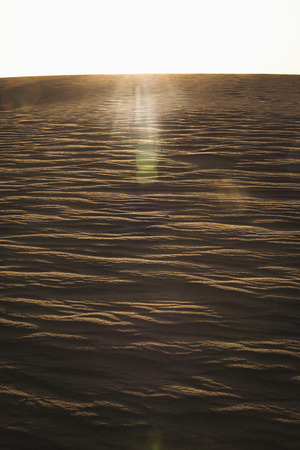 Sun coming down over a sand dune, no people, landscape, の写真素材