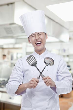 Chef With Cooking Utensils, Mouth Openの写真素材