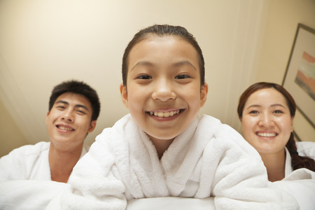Happy Family in Bed - Close-up of Daughterの写真素材