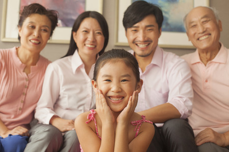 Multigenerational family smiling, portraitの写真素材