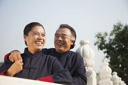 Senior couple dressed in traditional Chinese clothing, portraitの写真素材