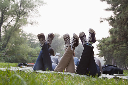 Teenagers hanging out in the park の写真素材
