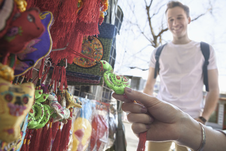 Young couple looking at souvenirs.