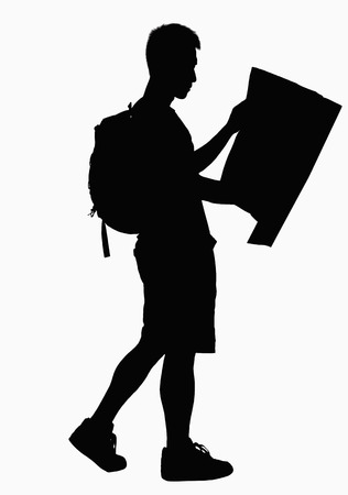 Silhouette of man looking at map. の写真素材
