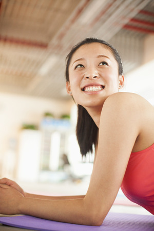 Young women practicing yogaの写真素材