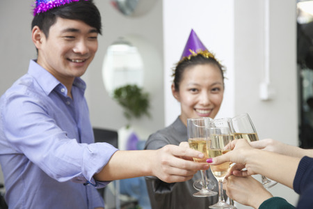 Business Colleagues Toasting With Champagneの写真素材
