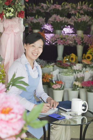 Florist Working In Flower Shopの写真素材