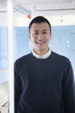 Businessman in the office, portraitの写真素材