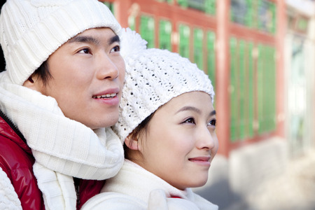 Happy couple hugging in Hutong Yardの写真素材
