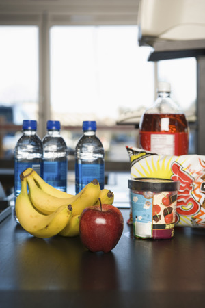 Groceries on a conveyor beltの写真素材