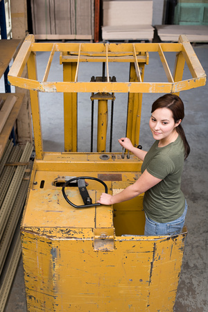 Woman on forklift truck