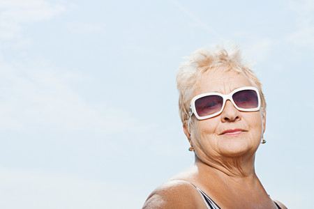 Senior woman wearing sunglassesの写真素材