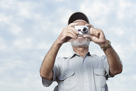 Man taking a photographの写真素材