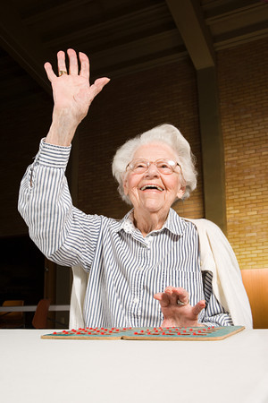 Senior woman playing bingoの写真素材