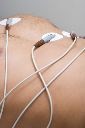 Person with electrodes on chest