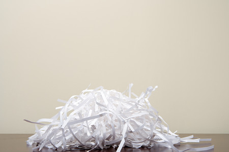 Shredded paper on deskの写真素材