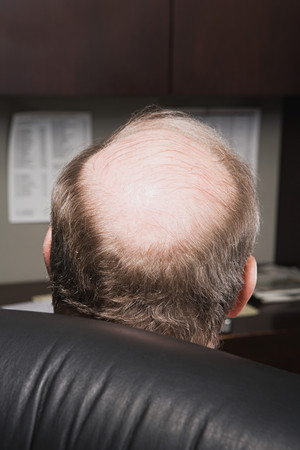 Mature businessman with bald headの写真素材