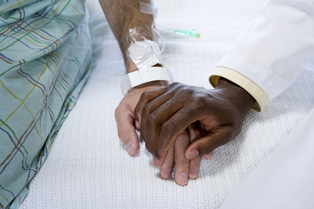 Doctor holding patients handの写真素材