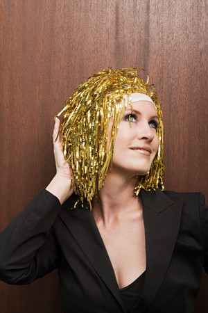 Woman wearing gold colour wig