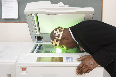 Man photocopying face