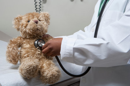 Girl pretending to be doctorの写真素材