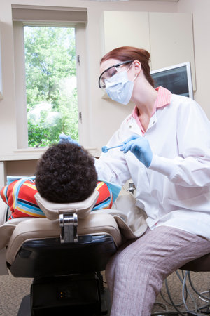 Dentist with patientの写真素材