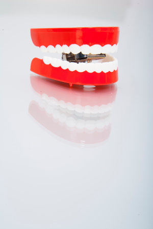 Chatter teeth on deskの写真素材