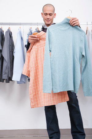 Consumers shopping for clothesの写真素材