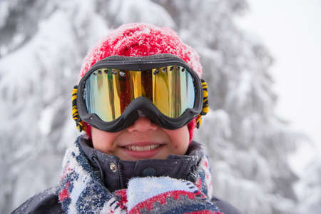 Children playing in the snowの写真素材