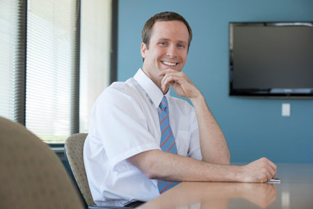 Portrait of business people in conference room