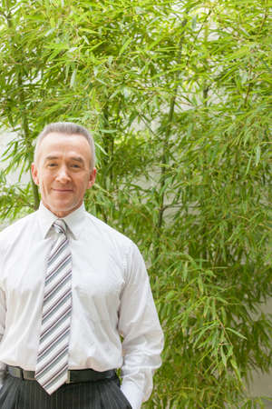Business person with bamboo