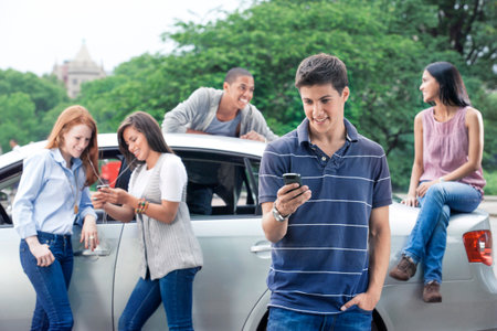 Teenagers with carの写真素材