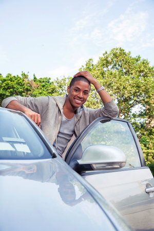 Teenagers with carの写真素材