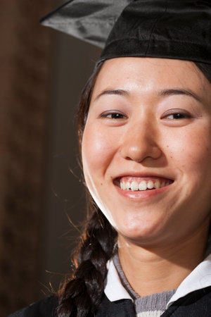 Students at graduation ceremonyの写真素材