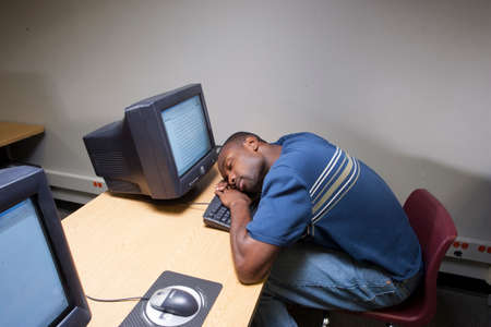 Student sleeping in computer lab