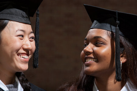 Students at graduation ceremonyの写真素材