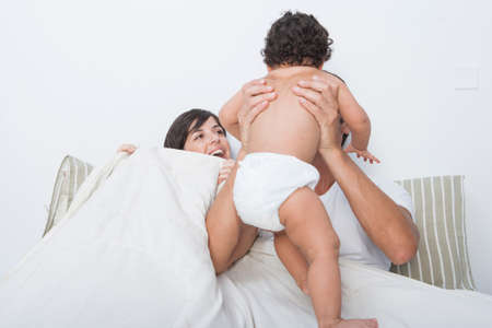 Hispanic family with babyの写真素材